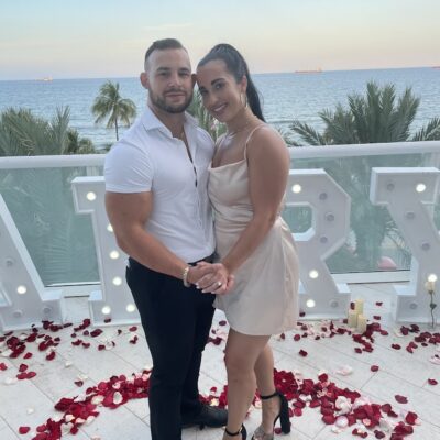 Miami Rooftop Proposal - Couple with Flowers