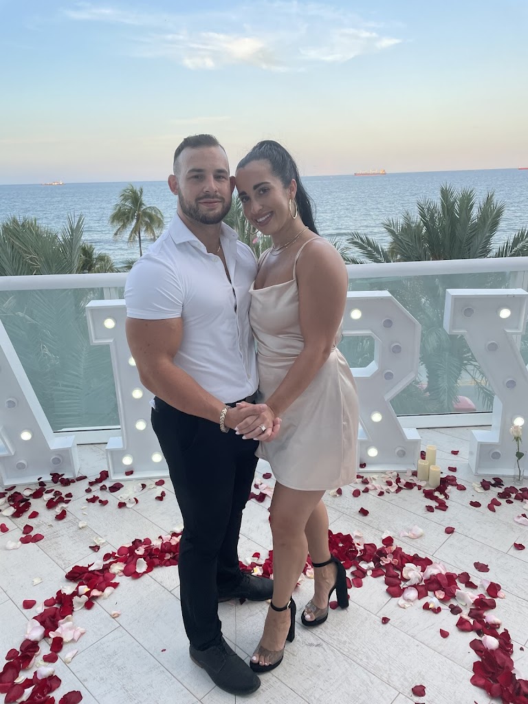 Miami Rooftop Proposal - Couple with Flowers