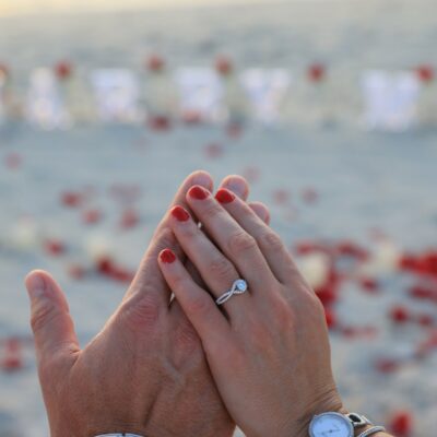 Newly Engaged Couple - Showing Engagement Ring at Beach