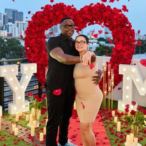 Beautiful couple showing off ring after Marry Me Proposal on Miami Rooftop