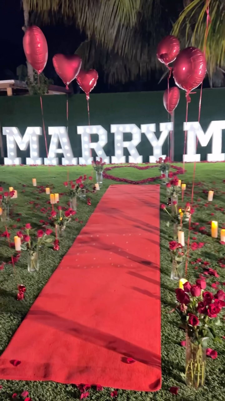 Marry Me Signs on Rooftop with Red Carpet