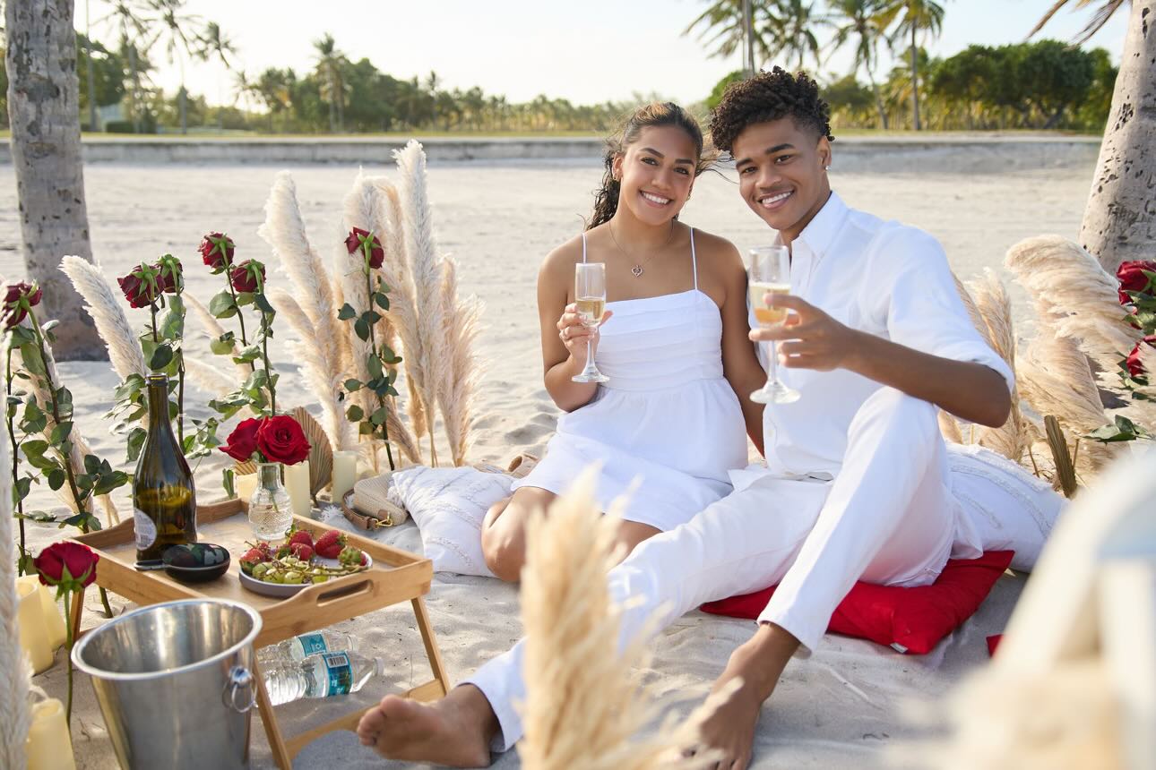 Miami Luxury Picnic - Couple Toasting on the Beach