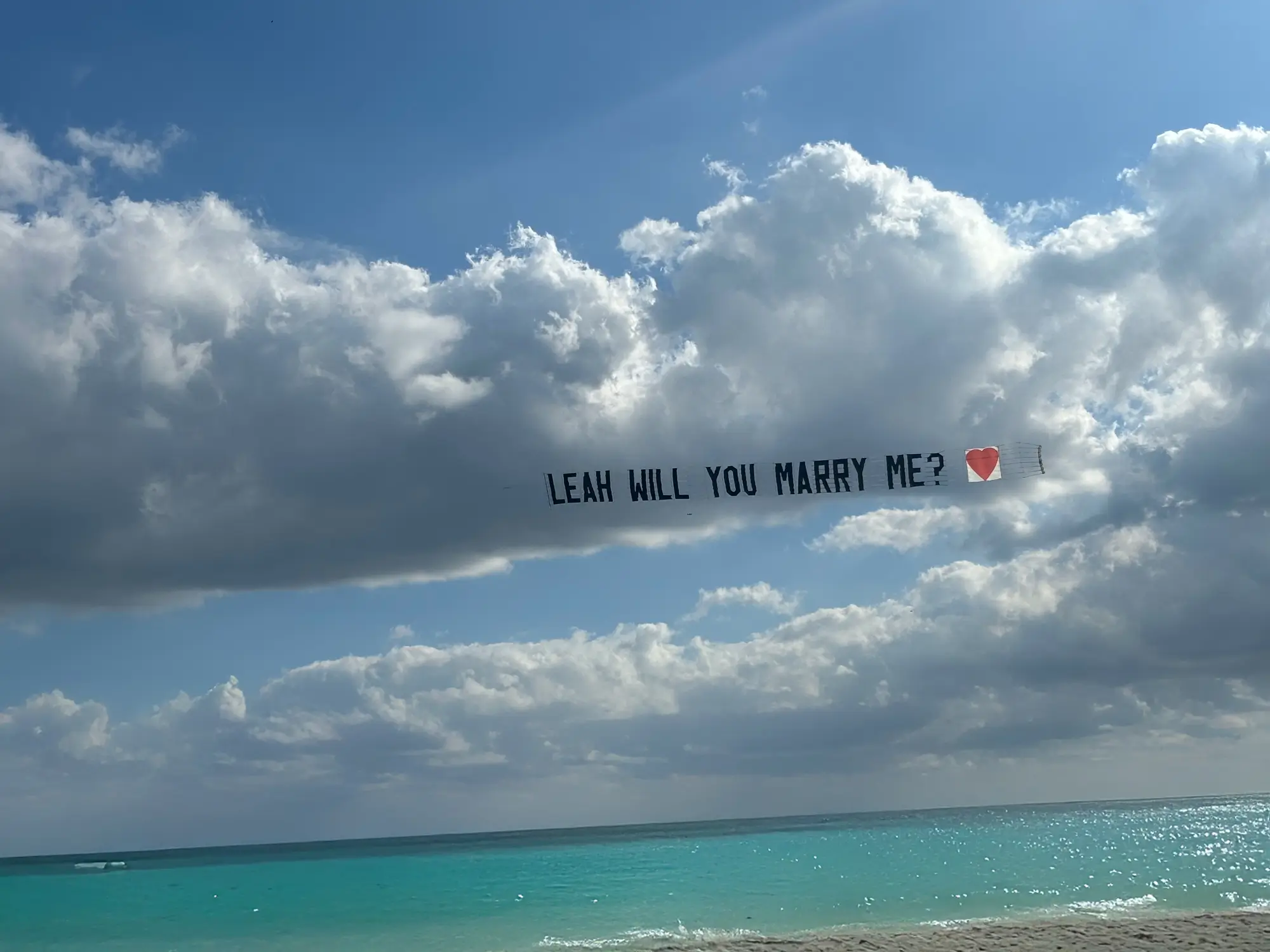 Will you marry me aircraft banner proposal - unique proposal Miami - Miami proposal planner and packages