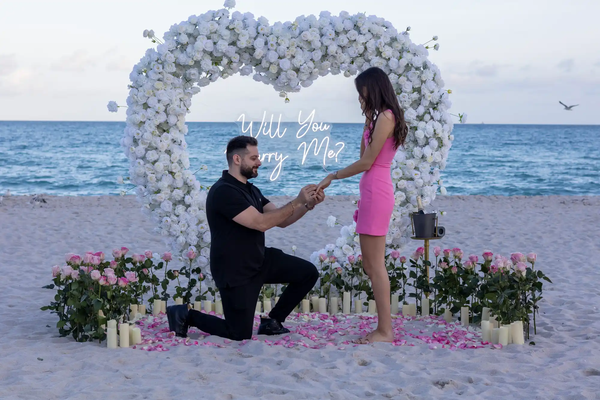 TMM Event - Valentine's Day proposal on Miami Beach with white roses and couple