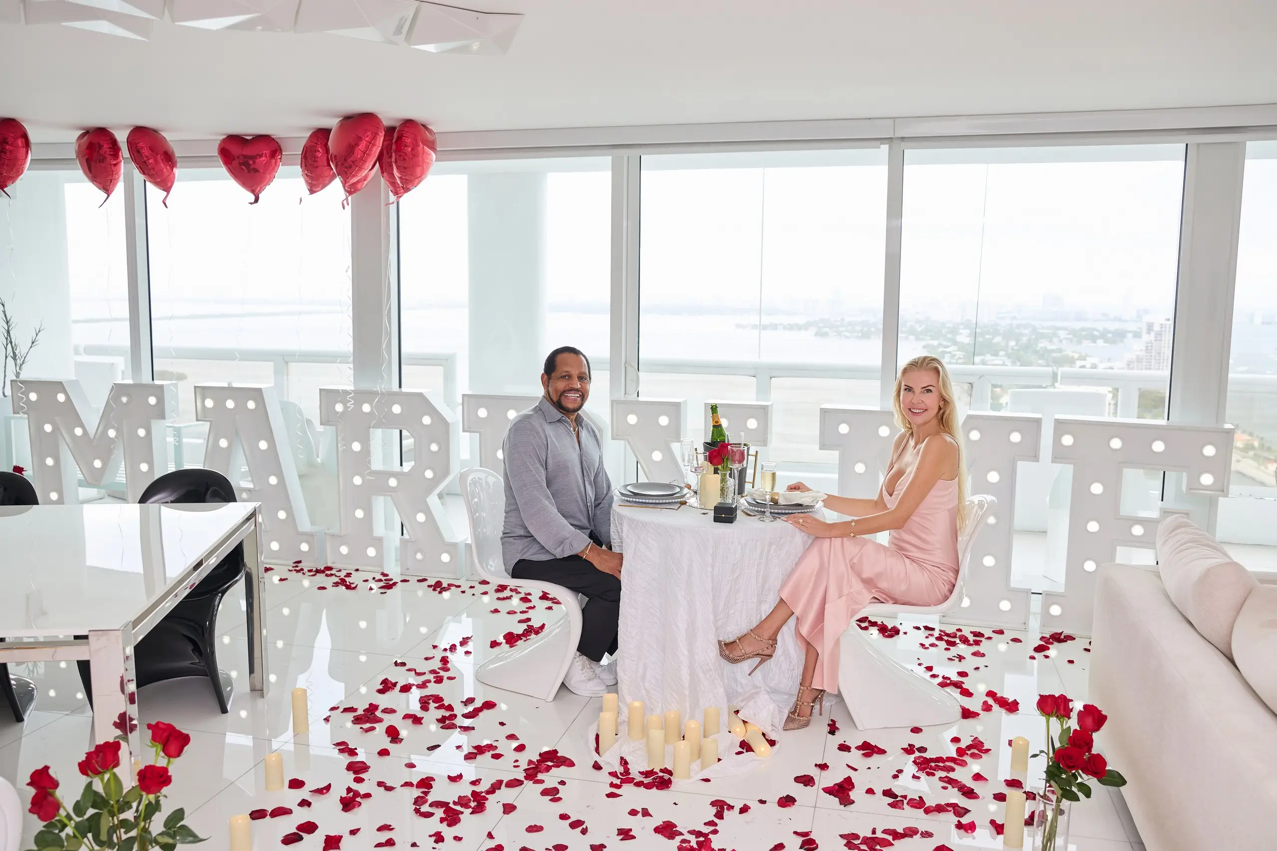 Happy couple - room makover proposal with letters and roses